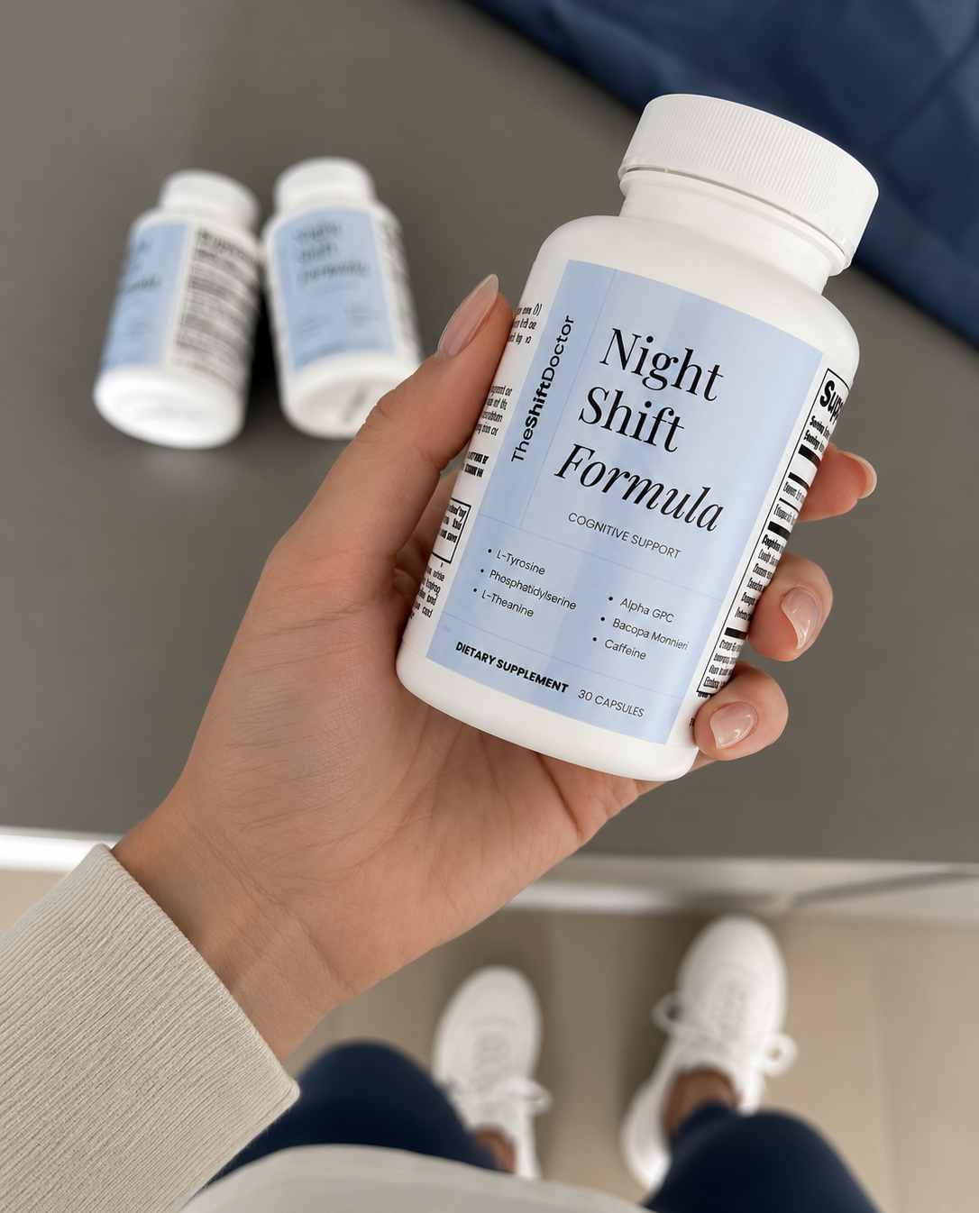Night Shift Formula bottle held in hand